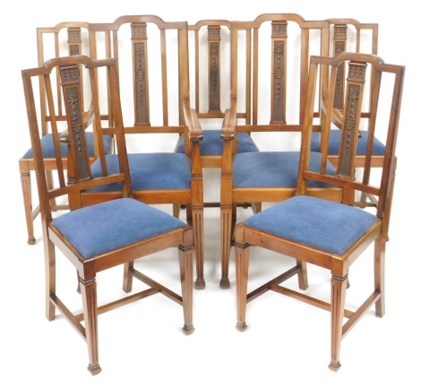 A set of seven late Victorian mahogany dining chairs, the column formed splat carved with harebells and bows, with drop in seats, raised on tapering square legs, comprising a pair of carvers and five single chairs.