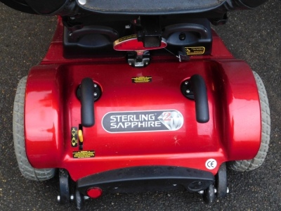 A Sterling Sapphire 2 mobility scooter, in red trim, with charger and cables. - 3