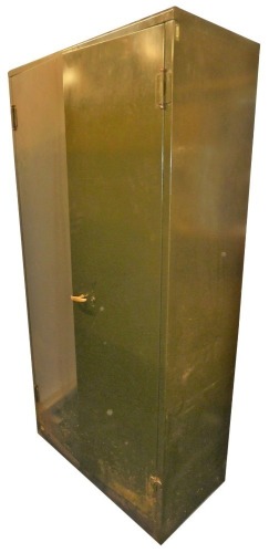 A Roneo green metal two door cabinet, the hinged door containing an arrangement of shelves, 182cm high, 89cm wide, 46cm deep.