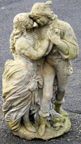 A composition garden statue, of two lovers in Regency dress, 63cm high.