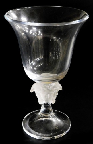 A Rosenthal Versace cut glass vase, the trumpet shaped bowl raised on a stem with a frosted glass Versace emblem, above an out swept circular foot, boxed, 32cm high.