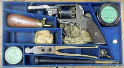 A Victorian double action percussion revolver, patent number 38162, together with a bullet mould, shot flask and other shooting apparel, in an oak case. - 2