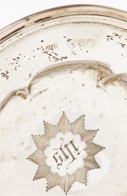 A Victorian silver communion set, comprising a challis engraved with the christogram 'For Jesus' within a star burst frame, similar salver for wafers, and a cut glass bottle with silver lid, engraved DBE, cased, with silver shield plaque engraved 'Present - 4