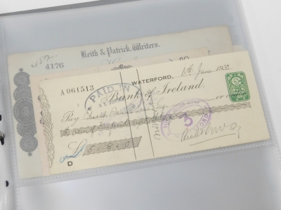 An album of English, Scottish and Irish cheques, including Gurneys, Barclays, and Midland branches, Birmingham and West Bromwich Albion Football Club, Clydesdale and Royal Bank of Scotland, Union Bank of Scotland, and The Bank of Ireland. - 4