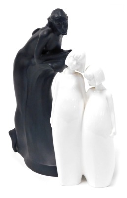 A Royal Doulton Black Images figure modelled as Free Spirit, HN3159, together with a white glazed Images figure modelled as Sisters, HN3018. (2)