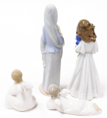 A Lladro matt figure of a girl holding a bunch of Calla lilies, a Nao figure of a girl holding a doll, and two Nao figures of cherubs. (4) - 2