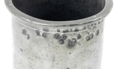 A 19thC pewter tankard, with a protruding rim, bearing various stamps, on a stepped base, stamped to underside Vincent, 18cm high. - 3