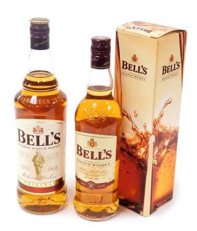 A Bells 1L bottle of Original Scotch whisky, together with a 70cl bottle of aged eight years whisky, boxed. (2)