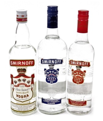 A bottle of Smirnoff vodka number 57, export strength, 1l, together with two bottles of Smirnoff vodka number 21, 70cl. (3)