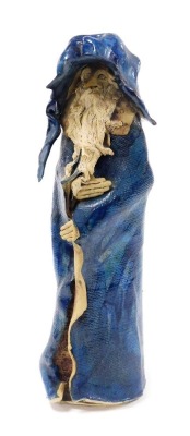 An Isobel studio pottery figure of a wizard, modelled standing with a blue glazed hat and cloak, limited edition 12/96, incised marks, 40cm high.