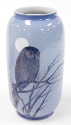 A Royal Copenhagen porcelain vase, of ovoid form, painted with an owl perched on a branch in the moonlight, number 347/107, printed and painted marks, 20.5cm high, together with two Royal Copenhagen boxes for a Blackberry vase and a Harebell vase. (3) - 2