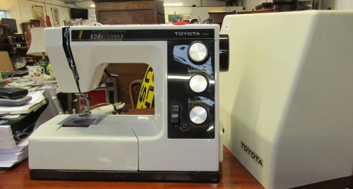 A cased Toyota sewing machine.