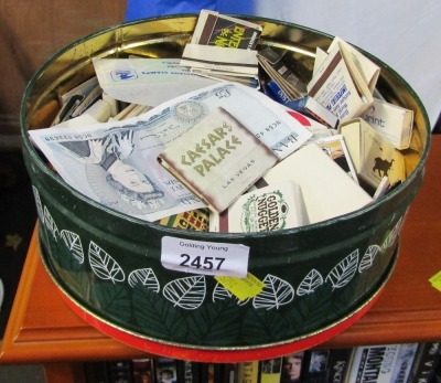 A replica Bank of England £5 note and various match cases.