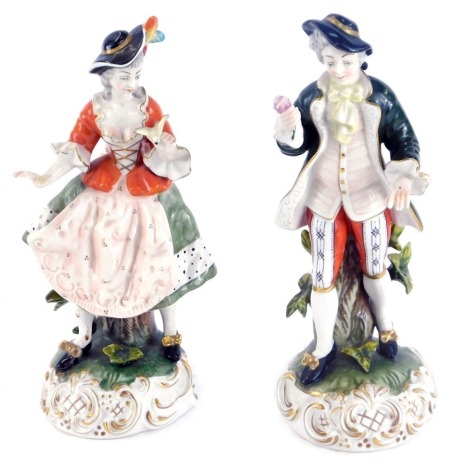 A pair of Dresden Art porcelain figures, comprising lady and gentleman in Regency dress, 24cm high. (2, AF)