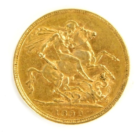 A Victorian full gold sovereign dated 1892.