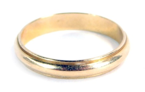 A wedding band, of beaded design, yellow metal stamped 14k, 3.2g all in.