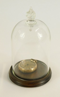 An early 20thC lady's pocket watch, open faced, keyless wind, dial floral engraved, in a partially floral engraved case with vacant shield reserve, stamped 14c, 23.3g all in, under a glass travel dome. (AF) - 4