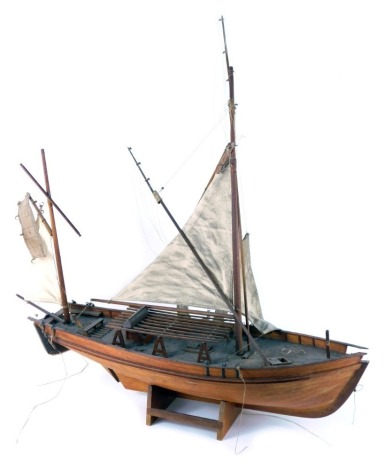 A wooden model of a Dutch barge, with three masted sails, 84cm high, 52cm wide. (AF)