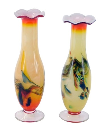 Two Art Glass vases, each with a red flared rim on a yellow mottled ground, tallest 22cm high. (2)