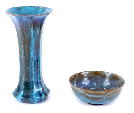 Two items of Pilkingtons Royal Lancastrian Pottery, comprising a blue glazed bowl, 14cm wide, and an octagonal flared rim blue glazed vase, 25cm high. (2)