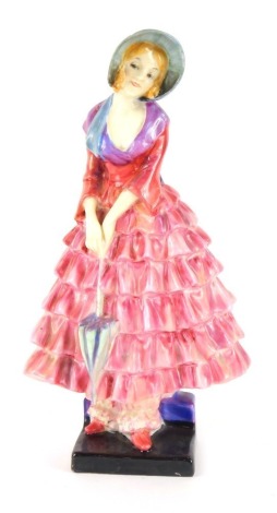 A Royal Doulton figure modelled as Priscilla, HN1340 21cm high. (AF)