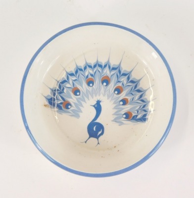 A Humphrey Wakefield Isle of Scilly pin dish, with peacock design on blue border, 10cm diameter. - 2