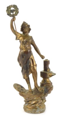 A spelter figure of a maiden, perched on a rock, representing Industry, 27cm high.