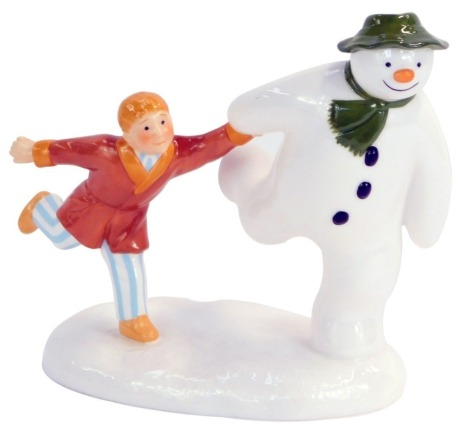 A Coalport Characters The Snowman figure group, The Adventure Begins, Snowman and Boy running, first edition, 13cm high, boxed.