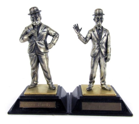 Two Royal Hampshire Laurel and Hardy figures, each on a black ebonised base, 11cm high, boxed.