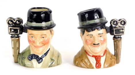 Two Royal Doulton Laurel and Hardy character jugs, comprising Oliver Hardy limited edition 2127/3500, and Stan Laurel limited edition 2127/3500, each 11cm high, boxed. (2)