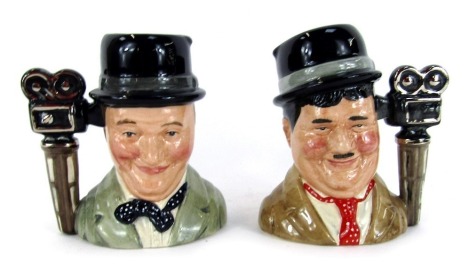 Two Royal Doulton Laurel and Hardy character jugs, comprising Oliver Hardy limited edition 1089/3500, and Stan Laurel limited edition 1089/3500, each 11cm high, boxed. (2)