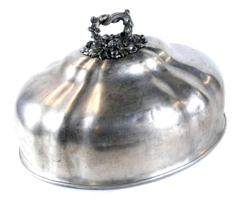 A silver plated meat dome, with applied rococo scroll handle, unmarked, 50cm wide.