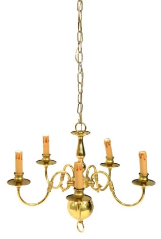 A 20thC brass five branch hanging chandelier, and associated wall light, chandelier 34cm high, wall light 24cm high.