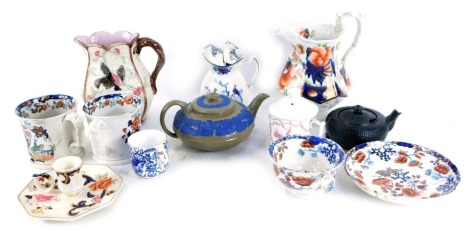 Pottery and porcelain, comprising a Mason style octagonal jug, a Mason Mandalay pattern candlestick and stand, a Dresden blue and white coffee cup, Majolica style Victorian bird jug, a brown drabware Wedgwood teapot sprigged in blue with flowers, a Contin