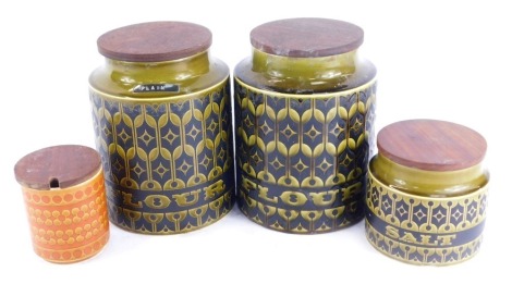 A Hornsea group of four pottery storage jars, comprising two large green Flour jars, a green Salt jar, and an orange preserve pot and cover. (4, AF)