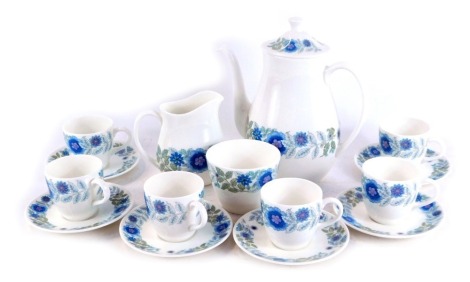 A Wedgwood Clementine pattern porcelain part coffee service, comprising coffee pot, six cups and saucers, milk jug and a sugar bowl.