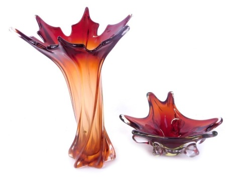 Two art glass vases, comprising a maple leaf design fluted rim vase, on ombre red lined design, 34cm high, and a fruit bowl, 25cm diameter. (2)