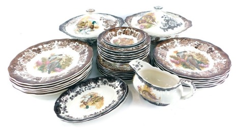 A Royal Worcester Palissy Game Series pattern pottery part dinner service, to include two tureens and covers, gravy boat, two saucers, seven dinner plates, six side plates, and various bowls. (a quantity)