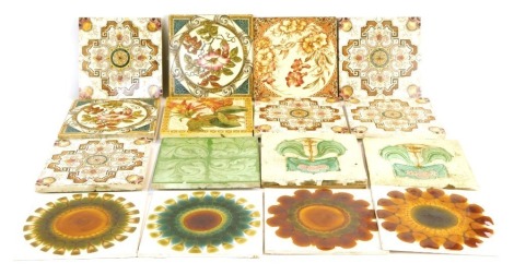 A group of Victorian majolica and 1960's fireside and kitchen tiles, 15cm x 15cm. (AF)