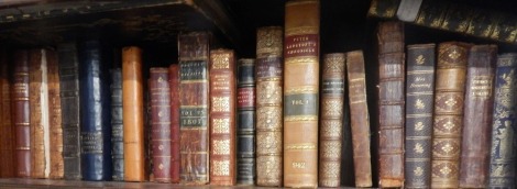 Leather and gilt bound books, including Ruskin, Monthly Magazines, Stories from Wagner, Grice's Decisive Battles, Tom Brown's School Days, Cowper's Poetical Works, Queens of England, etc. (1 shelf)