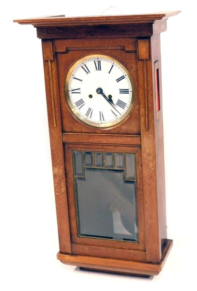 Lowercase Clock An early 20thC mahogany cased wall clock, with a white Roman numeric ...