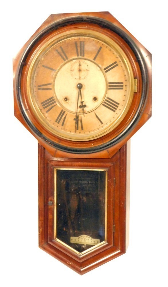 A late 19thC Ansonia Clock Company mahogany drop dial wall clock, the