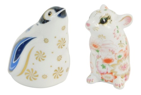 Two Royal Crown Derby paperweights, comprising Snowflake Penguin with gold stopper, and a Dormouse with gold stopper. (2)