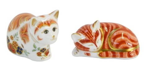 Two Royal Crown Derby cat paperweights, comprising Spice Collector's Guild Kitten, with gold stopper, and a further ginger cat, curled, with gold stopper. (2)