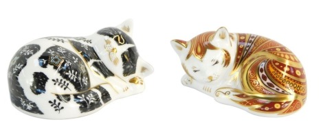 Two Royal Crown Derby animal paperweights, comprising Marmelo, limited edition 603/2500, with gold stopper, and Misty, with gold stopper. (2)