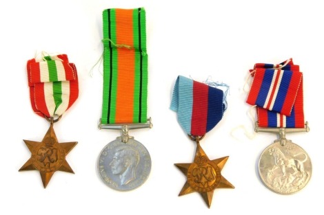 A group of WWII medals, comprising 1939-1945 Star, Italy Star, Defence Medal, and War Medal. (4)