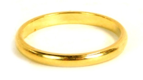 A wedding band, of plain design, yellow metal stamped 14k, size L, 1.8g all in.