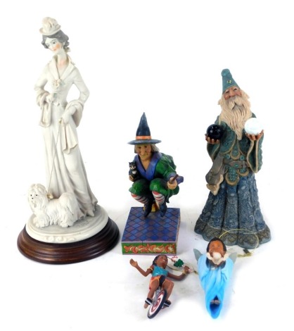 A Jim Shaw figure modeled as Swept Away, Hartwood Creek, No 405338, and a Hap Henriksen figure modeled as Balance of Truth, limited edition 2500, Capo di Monte figure of a lady walking a dog, and two Thomas Blackshear's hanging ornaments. (5)