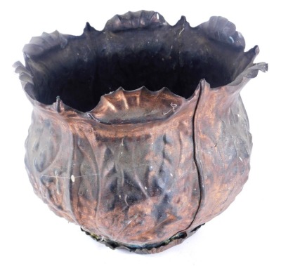 A hammered copper log basket, with a fluted top, 36cm high, 40cm diameter. (AF)