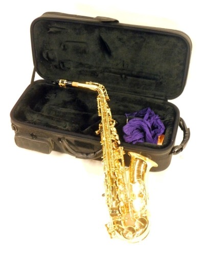 A Jupiter brass saxophone, in a black canvas fitted case.